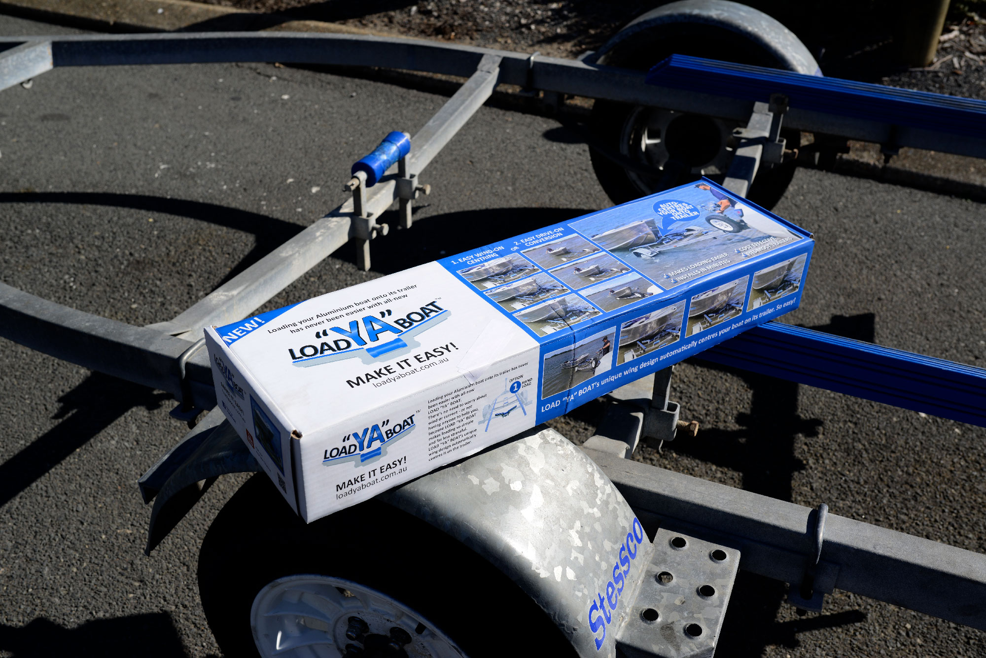 Finished Load Ya Boat packaged product photographed on a boat trailer